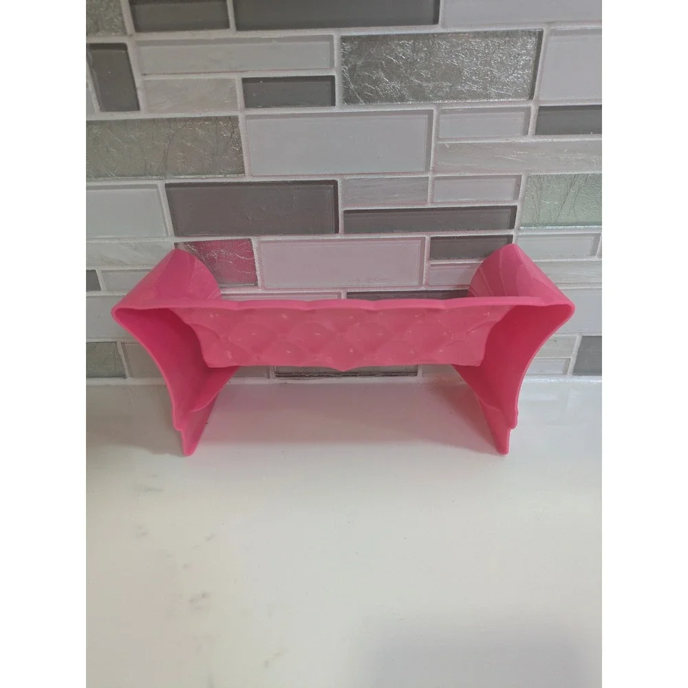 Barbie pink dollhouse